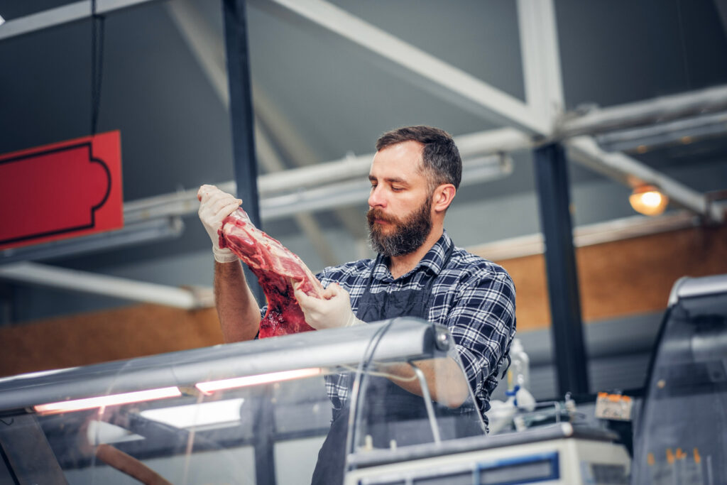 Bearded Meat Seller Serving Fresh Cut Meat 2025 01 25 02 30 39 Utc 1